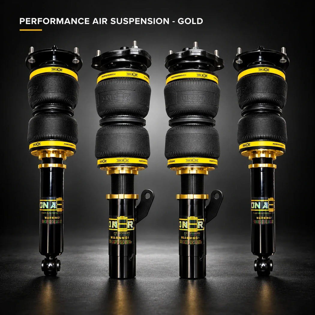 Full set of four ONAIR Performance Air Suspension shocks in gold collar finish, matching the suspension product page