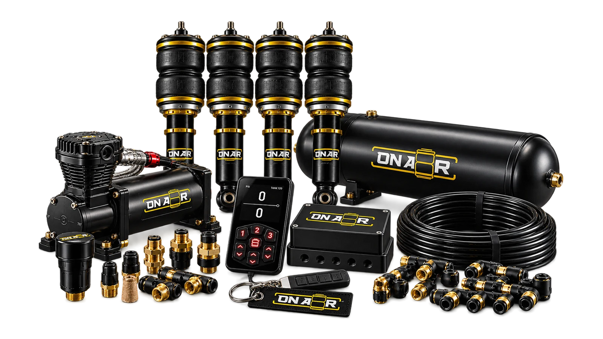 An illustrative complete ONAIR air ride kit presentation, showing four struts, compressor, tank, 2V controls, airline and fittings