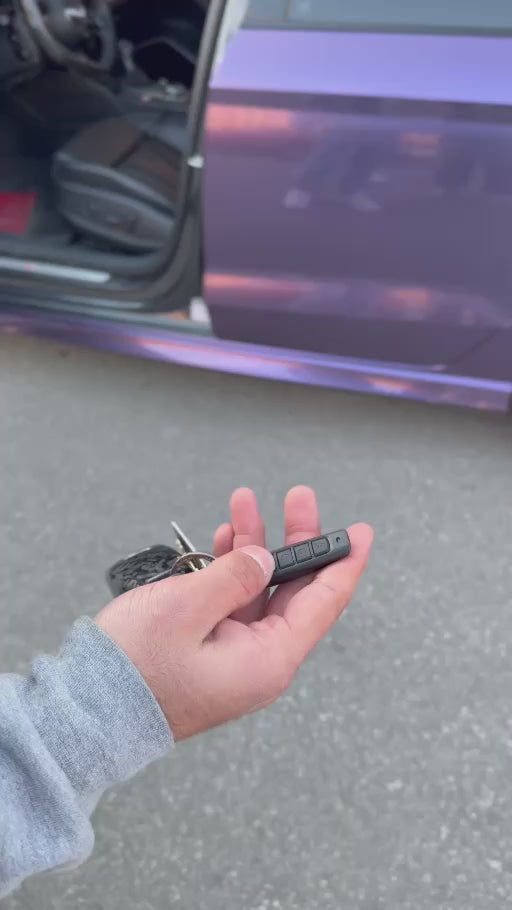 ONAIR 2V wireless key fob controlling a purple Audi