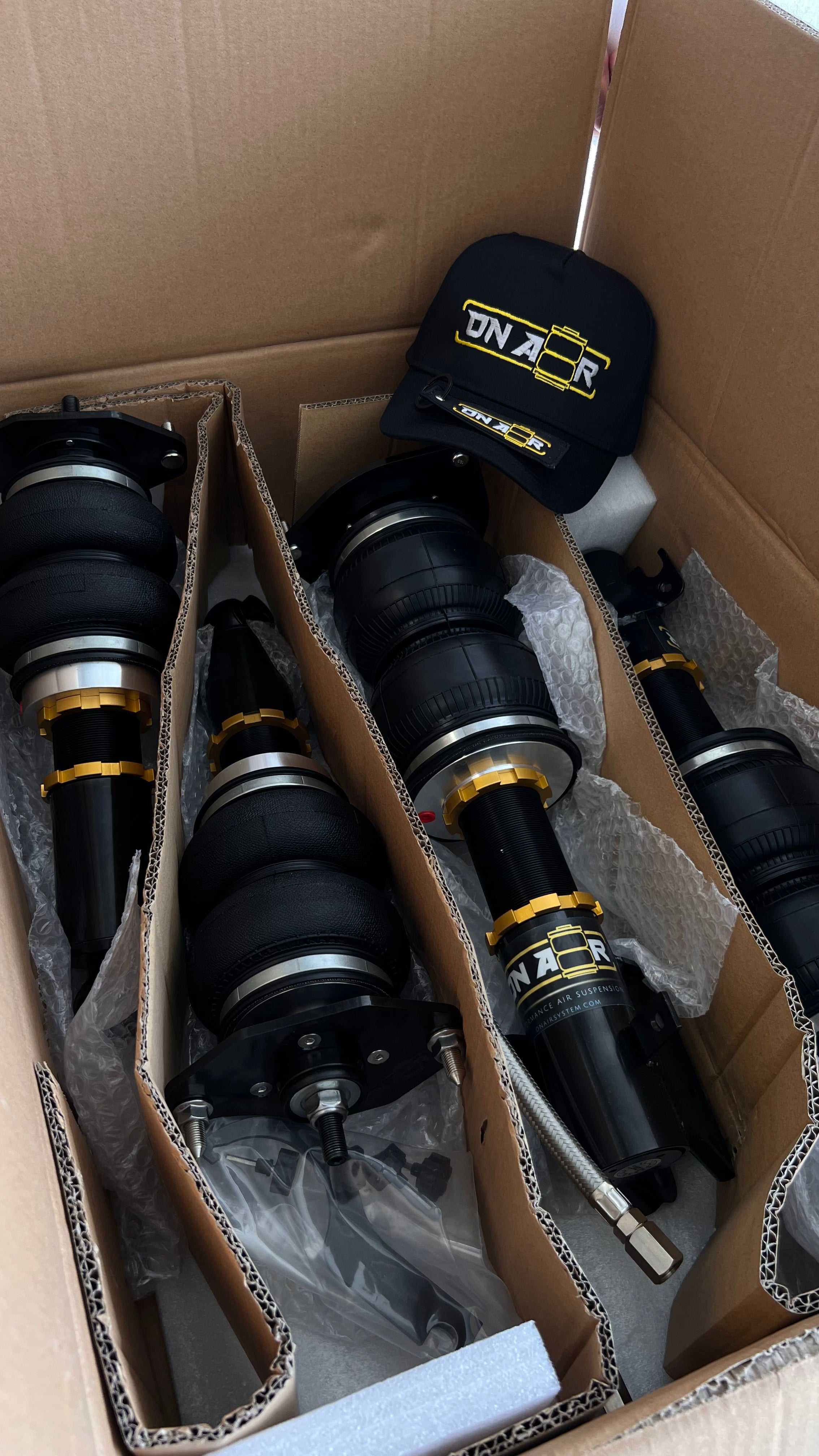 Image of onair video showing packaging and unboxing reveal of air suspension